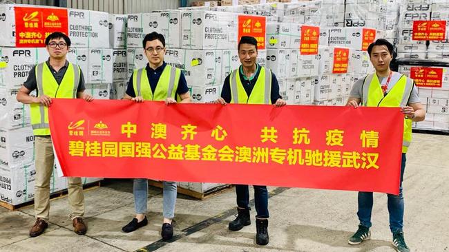 Medical protective gear sourced in Australia and shipped to China in February. The banner states: China-Australia work as one together to fight the pandemic. Picture: Linkedin