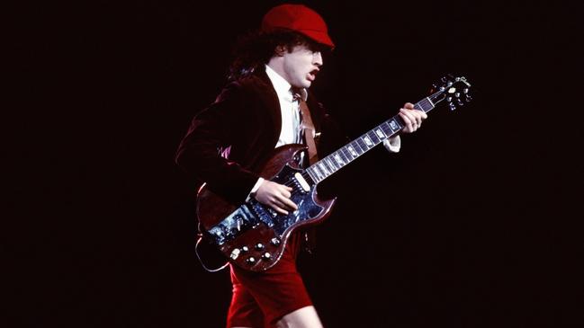 Angus Young of AC/DC performing at The Forum in Inglewood, California in 1985. Picture: Michael Ochs/Getty