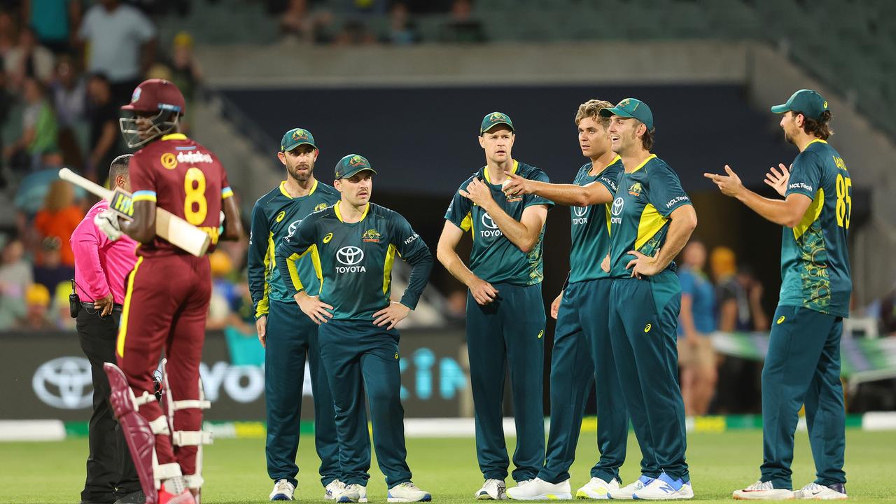 Mitchell Marsh tries to diffuse the situation as his side claims they’ve run out Alzarri Joseph. Picture: Sarah Reed/Getty Images.