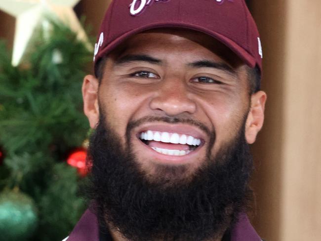 Payne Hass dropping off presents under the Broncos Christmas tree at Metro KIA, Windsor. Picture: Liam Kidston