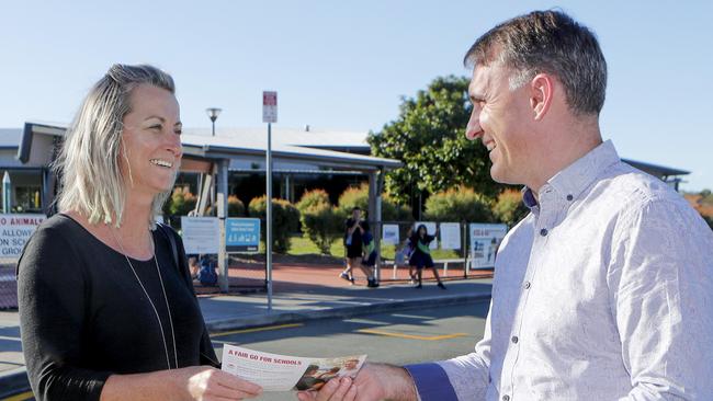 Labor candidate Des Hardman on the campaign trail at Norfolk Village State School talking with teacher Breanna Grimshaw from Shailor Park. Pic Tim Marsden.