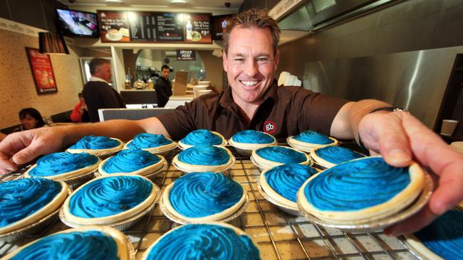 Former Easts and Souths rugby league captain Sean Garlick is blue pies for State of Origin at his bakery in Mascot, Sydney.