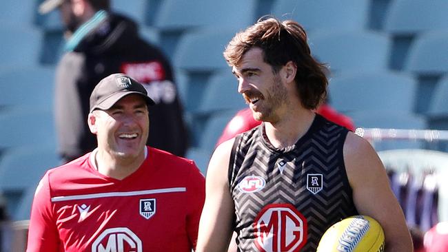 Scott Lycett talks to Matthew Lokan at training Picture: Sarah Reed