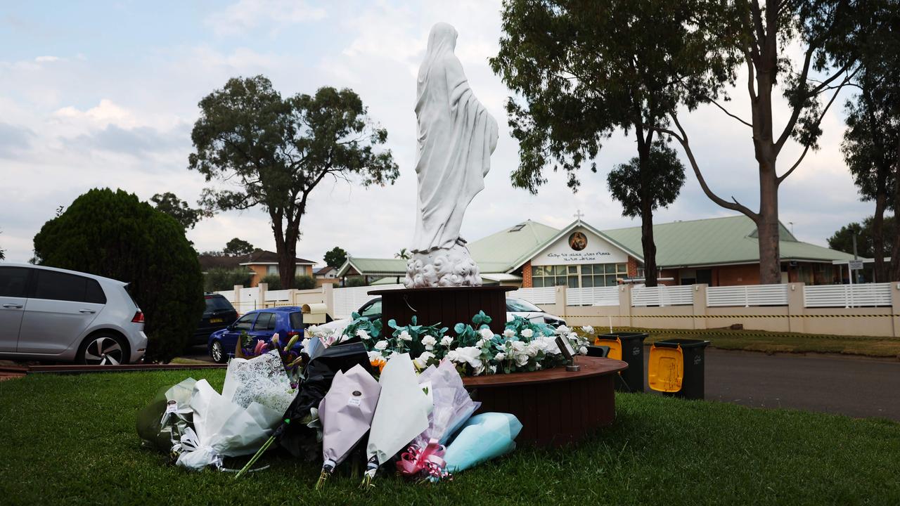 Flowers were left outside the church after the attack. Picture: Rohan Kelly