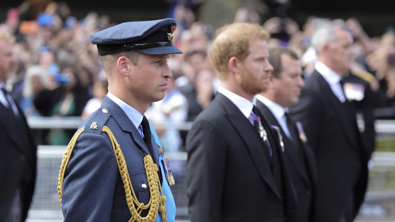 Prince William, Prince of Wales, and Prince Harry, Duke of Sussex walk behind the coffin during the procession for the Lying-in State of Queen Elizabeth II. (Photo by Chris Jackson/Getty Images)