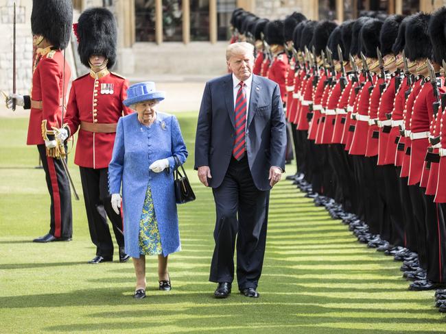 US President Donald Trump and Britain's Queen Elizabeth II inspect a Guard of Honour, formed of the Coldstream Guards at Windsor Castle. Picture: Getty Images