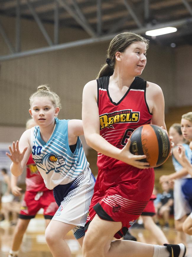 Gosford City Rebels player Emily Burnett looks for support during the under-14 women’s basketball playoff against Central Coast Waves at Breakers Indoor Sports Stadium. Picture: Troy Snook