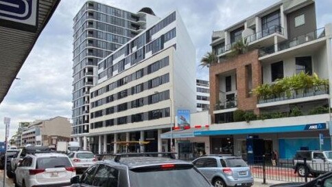 The site (centre) where a 9-storey boarding house development on Pittwater Rd in the Dee Why CBD. The one-storey building will be demolished. Picture: Archistar