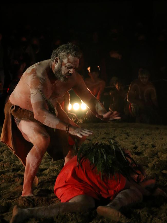 Aboriginal dancers perform at the opening ceremony for Dark Mofo 2021. The dancers led a Home State Reclamation Walk taking visitors to the Home State nipaluna installation at Dark Downtown on Liverpool St. Picture: Annie McCann.