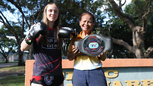 Muay Thai boxer Skyla Chatterton with NT Thai Association president Tou Saramat Ruchkaew at the festival’s new Civic Park location. Picture: George Yankovich