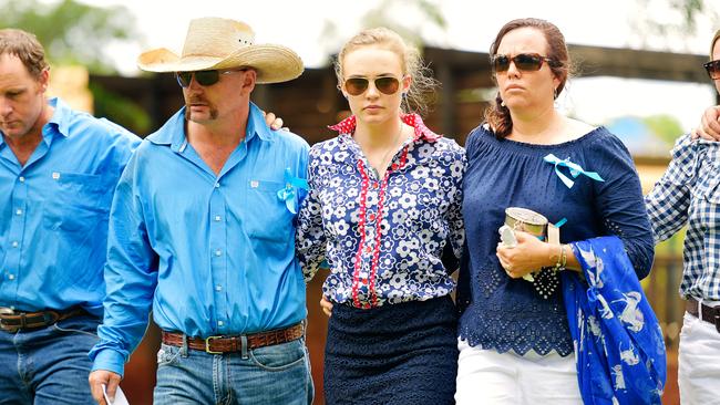 Tick Everett, Meg Everett, and Kate Everett (centre three) surrounded by family at Casuarina Street primary school after Dolly Everett's memorial service in Katherine, Northern Territory.