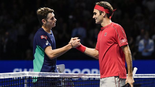 Alex de Minaur got a lesson from Roger Federer in 2019. Picture: Fabrice Coffrini / AFP