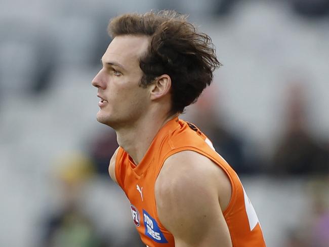 MELBOURNE, AUSTRALIA - JULY 14:  Jack Buckley of the Giants runs with the ball during the round 18 AFL match between Richmond Tigers and Greater Western Sydney Giants at Melbourne Cricket Ground, on July 14, 2024, in Melbourne, Australia. (Photo by Darrian Traynor/AFL Photos/via Getty Images)