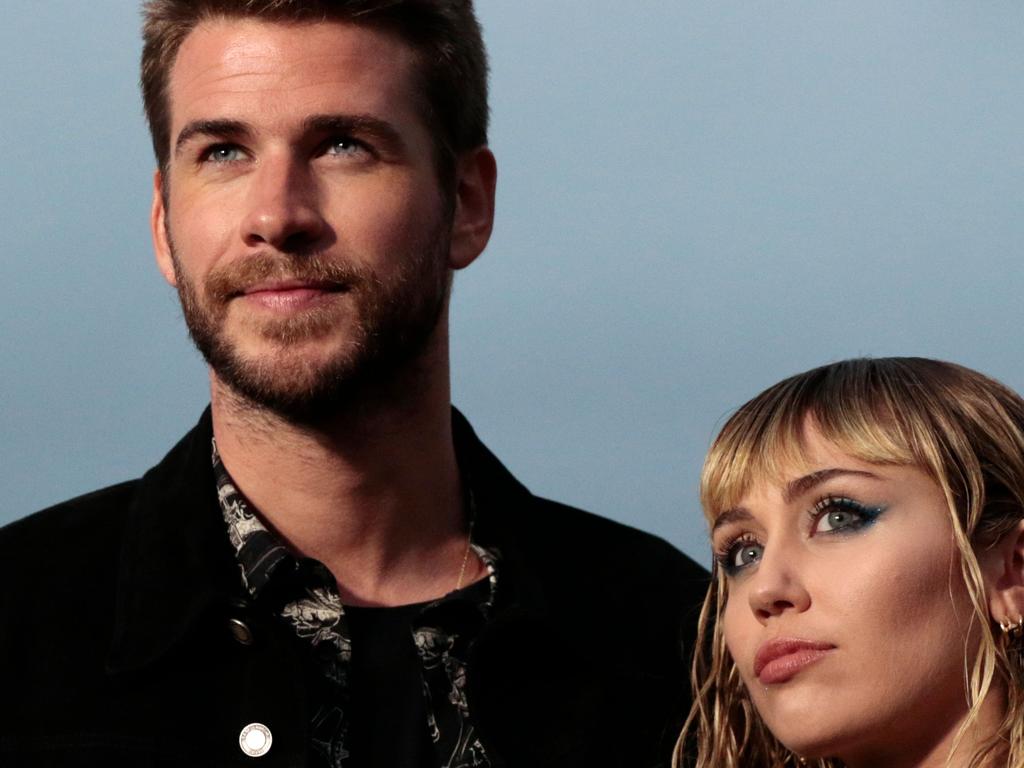 Miley Cyrus and Liam Hemsworth pre-divorce. Picture: AFP