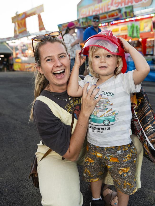 Kathleen Leggatt with son Koa Koland, 3, in sideshow alley at the Toowoomba Royal Show, Thursday, March 30, 2023. Picture: Kevin Farmer