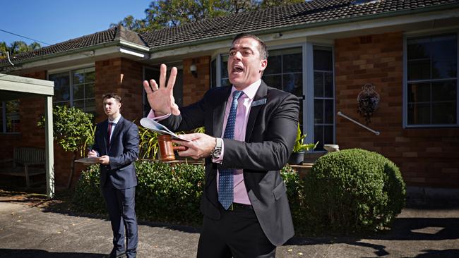 Auctioneer Chris Scerri at work at a Sydney auction in May. Picture: Adam Yip