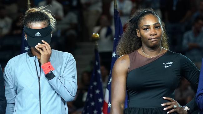 US Open Womens Single champion Naomi Osaka of Japan (L) with Serena Williams of the US during their Women's Singles Finals match at the 2018 US Open at the USTA Billie Jean King National Tennis Center in New York on September 8, 2018. (Photo by TIMOTHY A. CLARY / AFP)