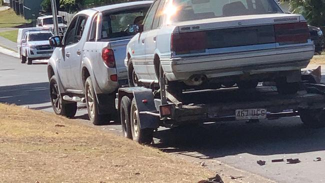 The man’s four-wheel drive with the trailer.