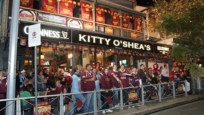 Queenslanders line Caxton Street during Origin time.