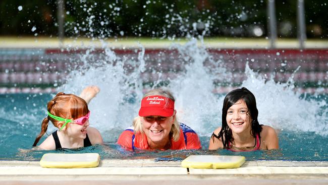 Love2Swim School senior swim teacher Sharon Mulligan with students Mackenzie Fog 7 and Lila Eglit 8. Picture: Alix Sweeney