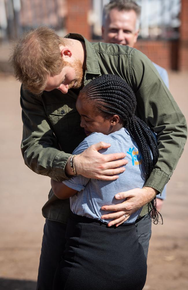 Harry is greeted by Tlotlo Moilwa during a visit to the Kasane Health Post, run by the Sentebale charity in Chobe National Park, Botswana. Photo: Dominic Lipinski