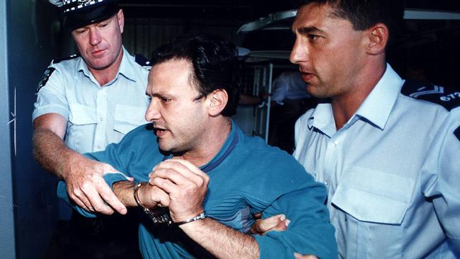 Domenic Perre being taken into court after his arrest for a drug-related matter Jan 1996. Picture: The Advertiser