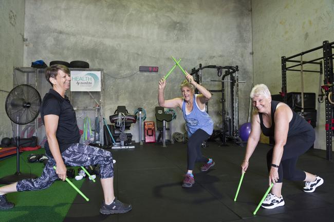 Health by Numbers owner Annemarie Lyons (left) with Gaye Hawkshaw and Sharon McGarry (right) demonstrate the pound fitness technique combining drumsticks and fitness, Tuesday, February 18, 2020. Picture: Kevin Farmer