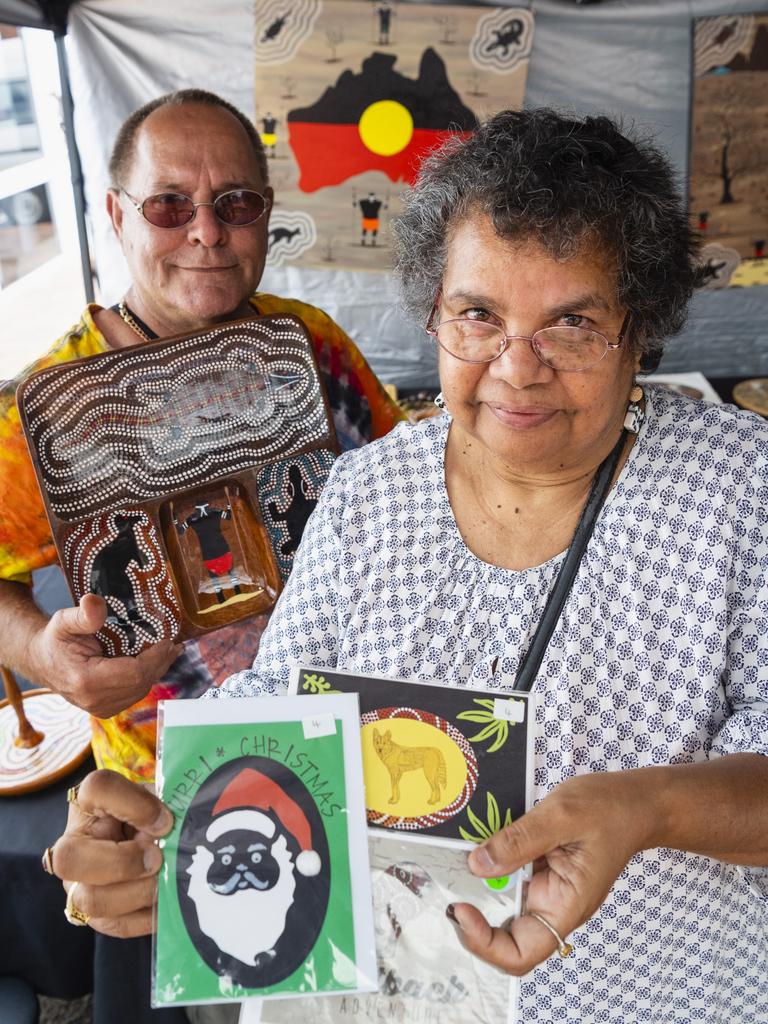 Husband and wife duo Greg and Dee Locke (DG Murri Wood Art and Australian Indigenous Cards) at their stall at the Indigenous Artisan Markets at The Lighthouse, Saturday, December 17, 2022.