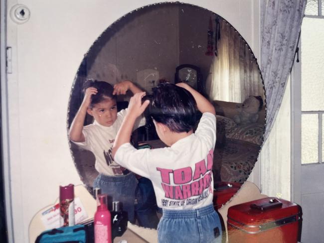 Anuisha Bone brushing his hair and putting gel in it as a young boy.