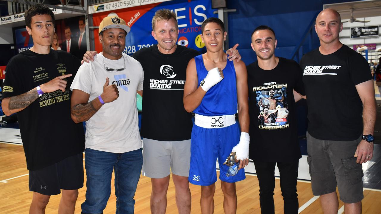 WBO world bantamweight champion Jason Moloney (second from right) with trainers and boxers at the Reef ‘n’ Beef Fight Night.