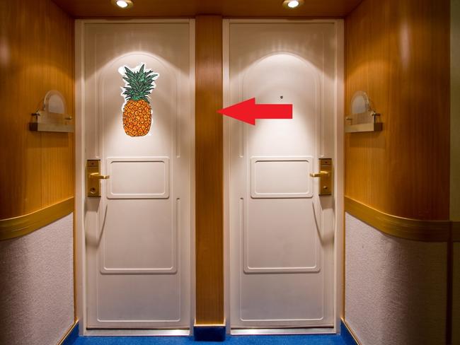 Double doors to fancy cabins on a cruise ship.