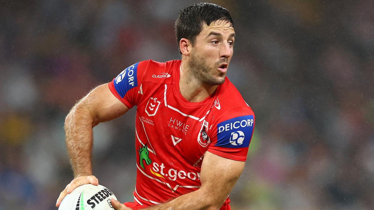 BRISBANE, AUSTRALIA - MAY 14: Ben Hunt of the Dragons looks to pass the ball during the round 10 NRL match between the Gold Coast Titans and the St George Illawarra Dragons at Suncorp Stadium, on May 14, 2022, in Brisbane, Australia. (Photo by Chris Hyde/Getty Images)