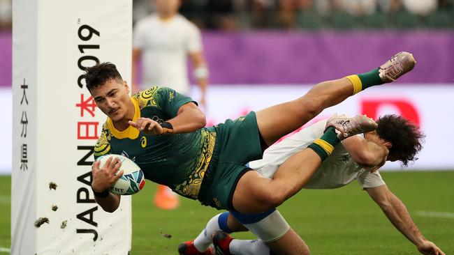 Petaia dives to score for the Wallabies in their World Cup fixture against Uruguay. Picture; Getty