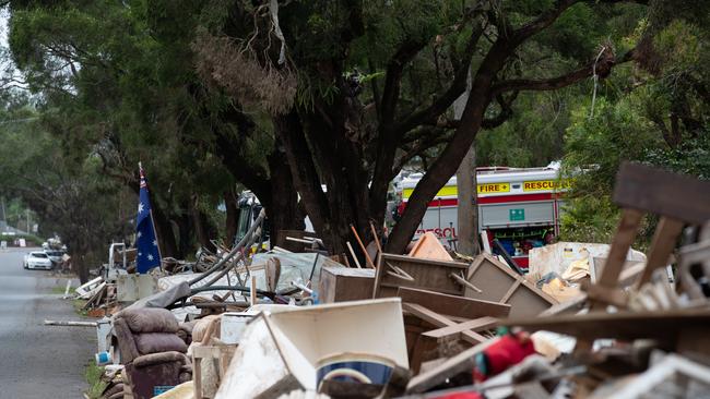 Masses of flood ruined household goods lined Lismore streets in the aftermath of the disaster. Picture: NCA NewsWire / Danielle Smith