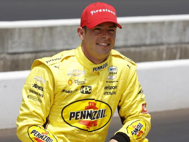 INDIANAPOLIS, IN - MAY 21: NTT IndyCar driver Scott McLaughlin poses for a photo with his car on May 21st, 2022 after qualifying for the 106th running of the Indianapolis 500 at the Indianapolis Motor Speedway in Indianapolis, Indiana.  (Photo by Brian Spurlock/Icon Sportswire via Getty Images)