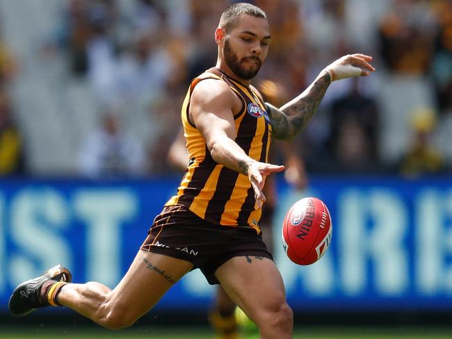 MELBOURNE, AUSTRALIA - MARCH 28: Jarman Impey of the Hawks kicks the ball during the 2021 AFL Round 02 match between the Hawthorn Hawks and the Richmond Tigers at the Melbourne Cricket Ground on March 28, 2021 in Melbourne, Australia. (Photo by Michael Willson/AFL Photos via Getty Images)