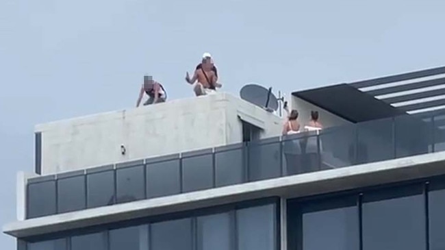 Young people pictured during an out-of-control party at Jefferson Lane in Palm Beach on Australia Day.