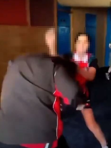 One of the videos shows a student under attack ...