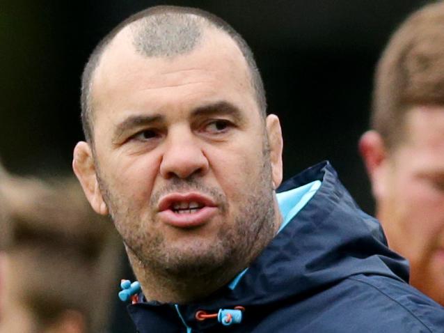 Michael Cheika talks to his team during Waratahs training at Kippax Oval,Moore Park.Picture Gregg Porteous