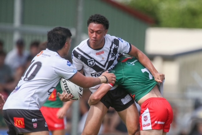 Magpies winger Saia Poese looks to offload in round 1 of the Meninga Cup. Picture: Stephen Archer.