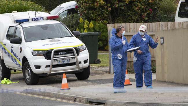 Forensic officers at the scene of the shooting in William St, Devonport. Picture: Grant Wells