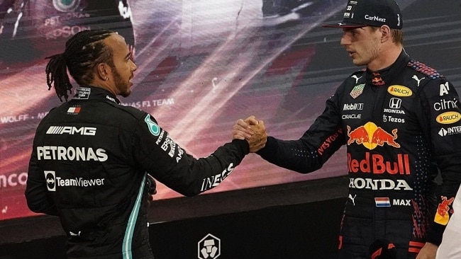 Hamilton and Verstappen shake hands minutes after the conclusion of the race. Both paid tribute to pushing one another to the final Grand Prix of the season. Picture: Hasan Bratic/picture alliance via Getty Images