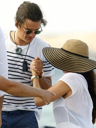 Ex swap ... Orlando Bloom and Erica Packer boarding a yacht in Formentera, Spain, earlier this month. Picture: Splash News
