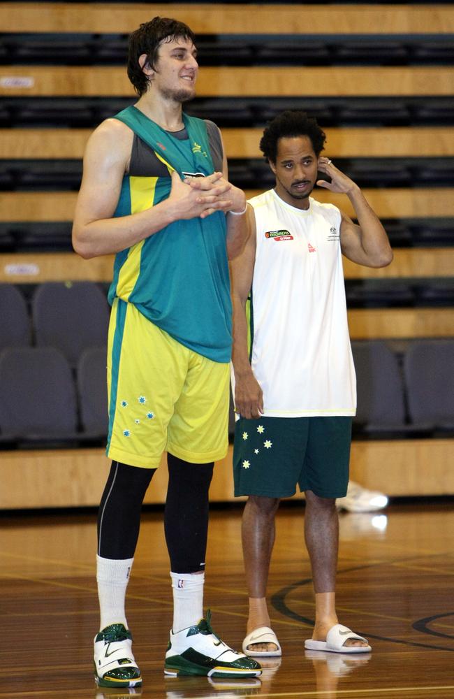 Andrew Bogut with Bruton during a training session in 2008.