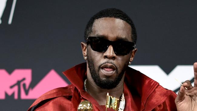 NEWARK, NEW JERSEY - SEPTEMBER 12: Diddy poses in the press room with his Global Icon Award at the 2023 MTV Video Music Awards at Prudential Center on September 12, 2023 in Newark, New Jersey. (Photo by Dimitrios Kambouris/Getty Images)