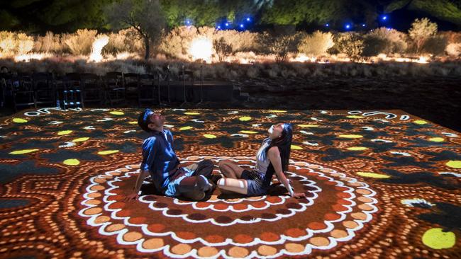 Visitors ay one of the previous Parrtjima light installations. Last year, the festival broke attendance records in Alice Springs. Photo: contributed.