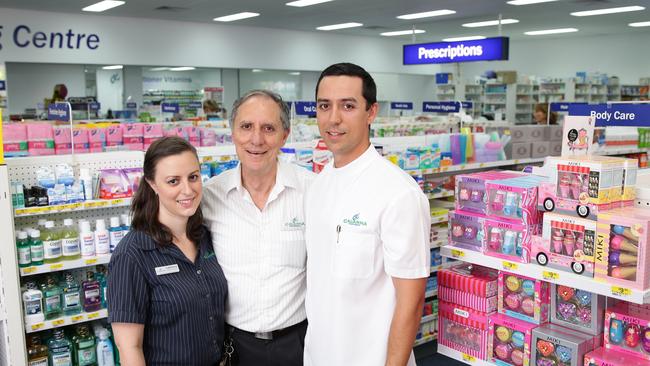 Calanna Pharmacy Group founder Mario Calanna with children Catherine and Matthew at the opening of a new $1.2 million Woree pharmacy in 2013.