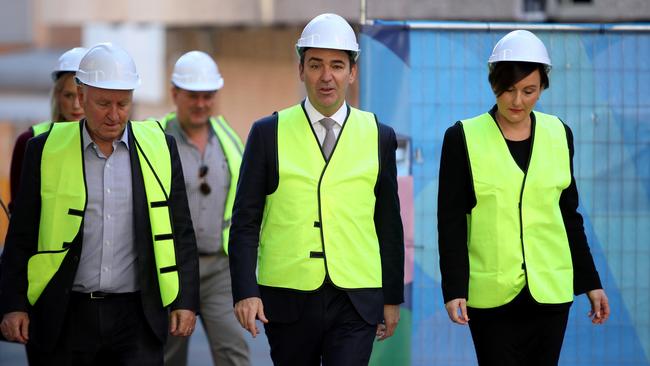 Former Renewal SA chief executive John Hanlon with Premier Steven Marshall and former Renewal SA executive Georgina Vasilevski touring the old Royal Adelaide Hospital in 2018. Picture: AAP / Kelly Barnes