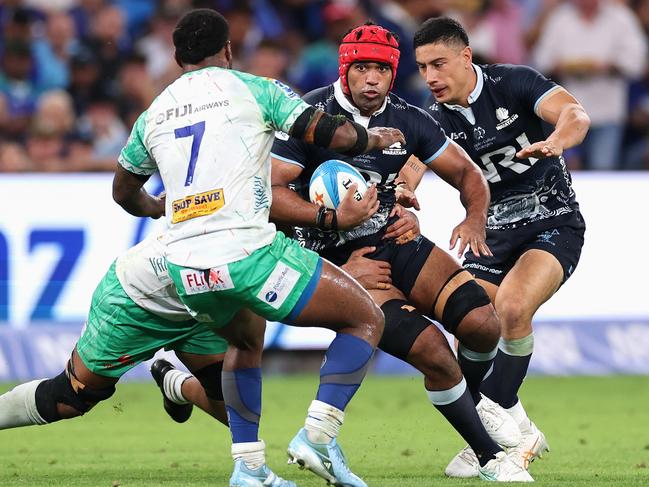 SYDNEY, AUSTRALIA - FEBRUARY 28: Langi Gleeson of the NSW Waratahs is tackled during the round three Super Rugby Pacific match between NSW Waratahs and Fijian Drua at Allianz Stadium, on February 28, 2025, in Sydney, Australia. (Photo by Cameron Spencer/Getty Images)