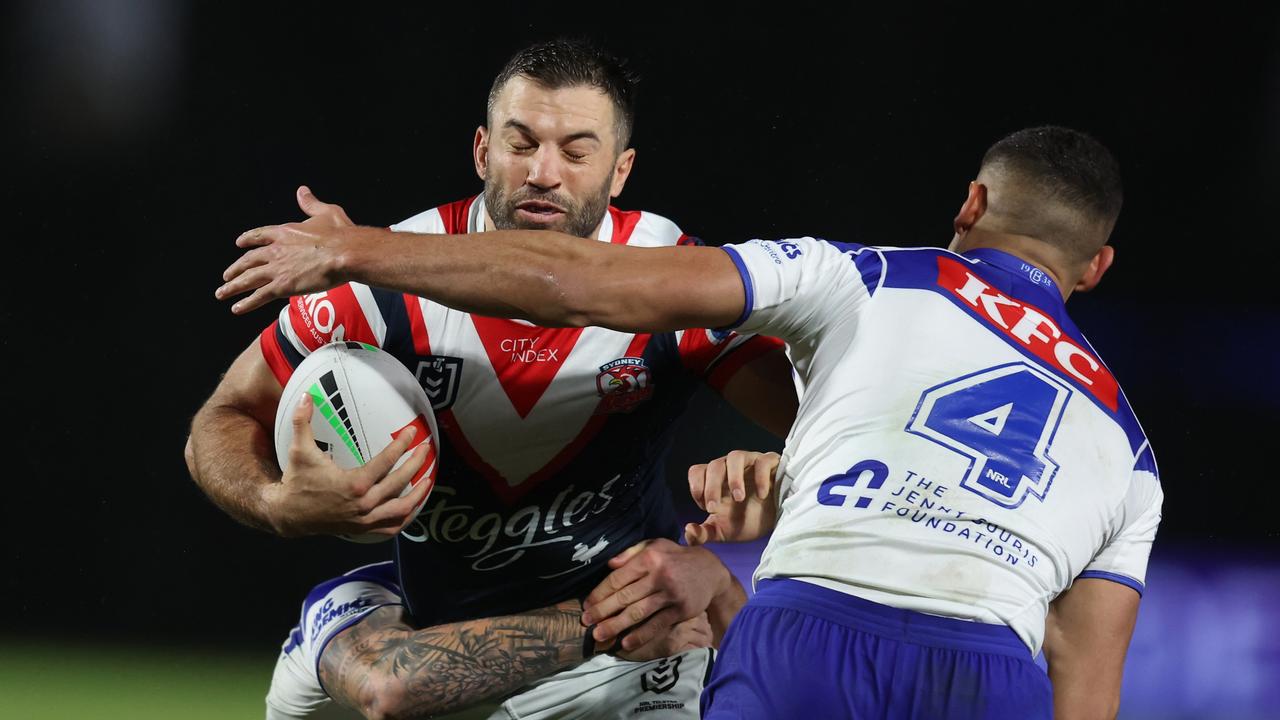 GOSFORD, AUSTRALIA - JUNE 22: James Tedesco of the Roosters with the ball of the Bulldogs during the round 16 NRL match between Sydney Roosters and Canterbury Bulldogs at Industree Group Stadium, on June 22, 2024, in Gosford, Australia. (Photo by Scott Gardiner/Getty Images)